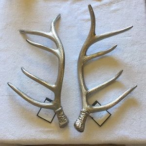 Pair of silver Threshold © decorative antlers